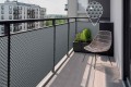 Osłona-balkonowa-oczkowana-RX-111--szary-z-czarnym-balkon.jpg