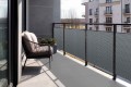 Osłona-balkonowa-oczkowana-RX-111--szary-z-czarnym-balkon-2.jpg